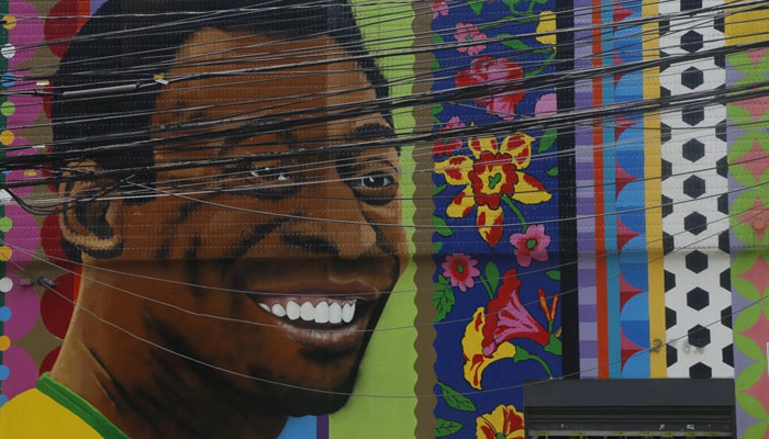 View of a mural depicting Brazilian football legend Pele by artist Aleksandro Reis in Sao Paulo on Saturday. AFP