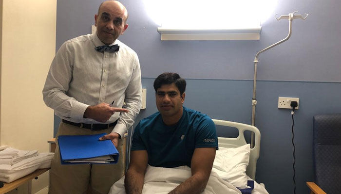 Nadeem (R) with Bajwa (L) after the surgery — File