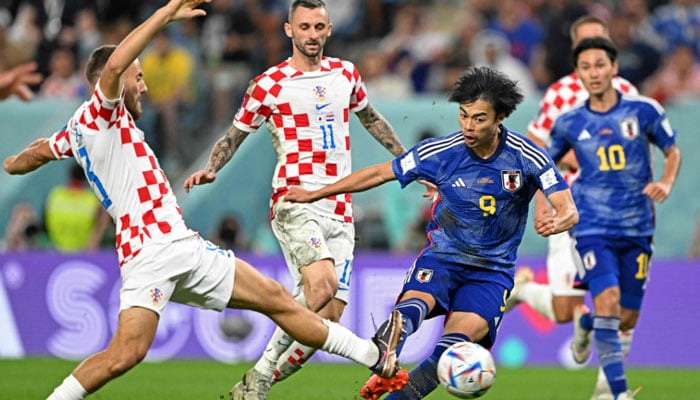 Japan’s forward #09 Kaoru Mitoma shoots but fails to score during the Qatar 2022 World Cup round of 16 football match between Japan and Croatia at the Al-Janoub Stadium in Al-Wakrah, south of Doha on December 5, 2022. — AFP