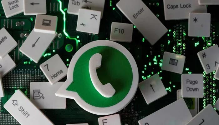 A 3D-printed WhatsApp logo and keyboard buttons are placed on a computer motherboard in this illustration taken January 21, 2021. — Reuters/File