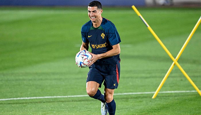 Portugal´s forward Cristiano Ronaldo takes part with his teammates in a training session at Shahaniya Sports Club of Al Samriya Autograph Collection Hotel in Al Samriya, northwest of Doha on December 4, 2022. — AFP