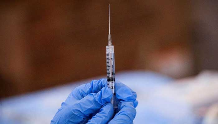 A syringe is filled with a dose of Pfizers coronavirus disease (COVID-19) vaccine at a pop-up community vaccination center at the Gateway World Christian Center in Valley Stream, New York, U.S., February 23, 2021. — Reuters