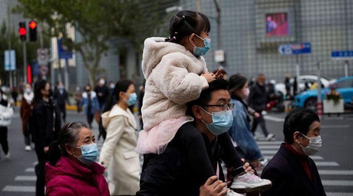 'Too many positives!': As China rows back 'zero-COVID' policy, virus fears spread