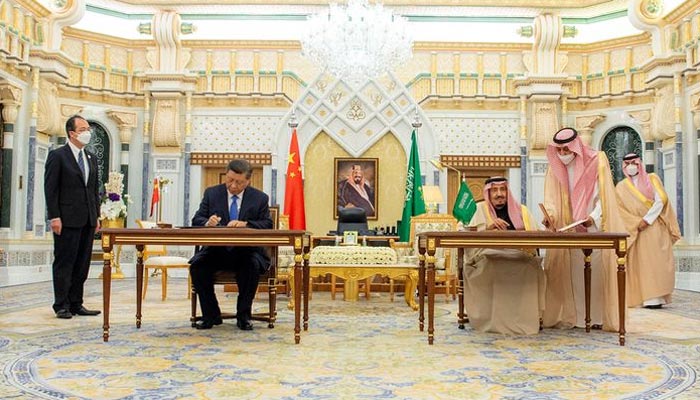Saudi King Salman bin Abdulaziz and Chinese President Xi Jinping sign documents during a meeting in Riyadh, Saudi Arabia December 8, 2022. — Reuters