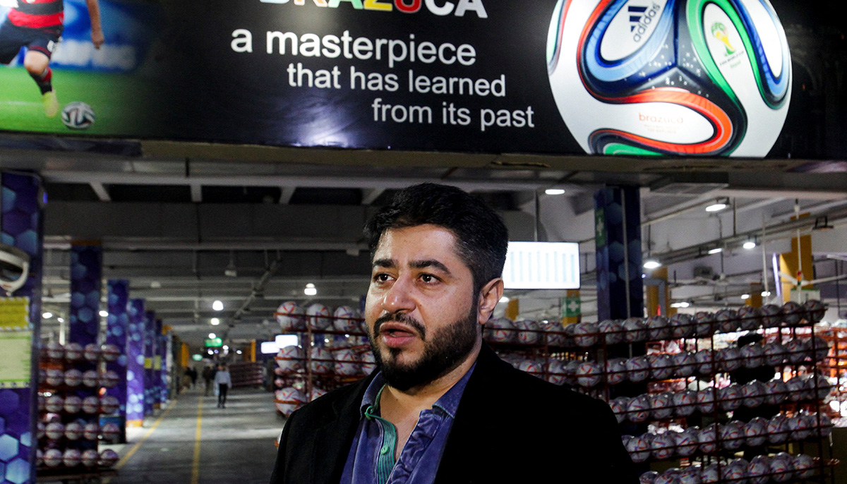 Hassan Masood Khawaja director of Forward Sports, the official manufacturer of sports goods for Adidas, speaks with Reuters at his factory in Sialkot, Pakistan November 30, 2022. — Reuters