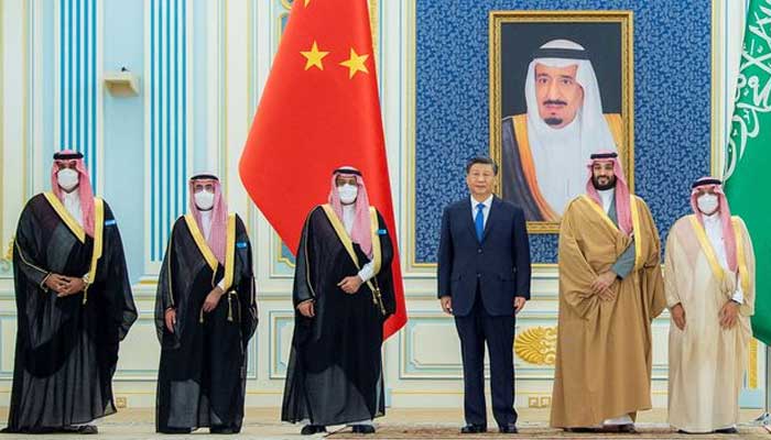 Saudi Crown Prince Mohammed Bin Salman stands with Chinese President Xi Jinping in Riyadh, Saudi Arabia December 8, 2022. — Reuters