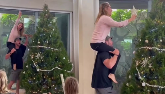 Chris Hemsworth takes on high-risk Christmas tradition with Elsa Pataky