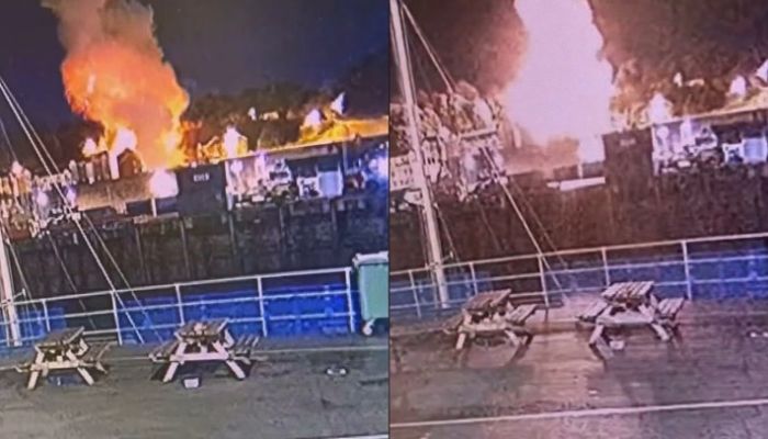 The combo image shows the moment of the explosion early on Saturday morning at a block of flats on the island of Jersey.— Screengrab via Twitter