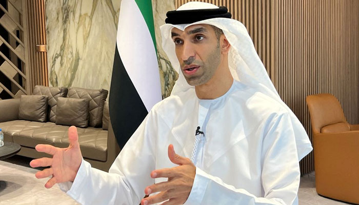 United Arab Emirates Minister of State for Foreign Trade Thani Al Zeyoudi gestures during an interview with Reuters in Dubai, June 30, 2022. — Reuters