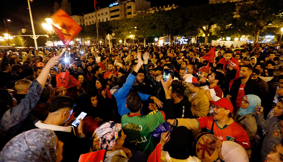 People celebrate after the match. —Reuters