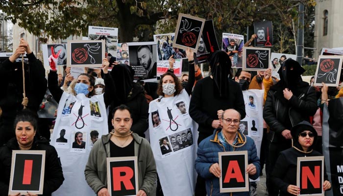 People take part in a protest against the Islamic regime of Iran following the death of Mahsa Amini, in Istanbul, Turkey, Dec. 10, 2022. — AFP