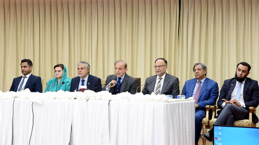(L to R) Special Assistant to the Prime Minister on Public Policy and Strategic Communications Fahd Husain, Minister for Information and Broadcasting Marriyum Aurangzeb, Minister for Finance and Revenue Senator Ishaq Dar, Prime Minister Shehbaz Sharif, Minister for Planning, Development, and Special Initiatives Ahsan Iqbal, Minister for Law and Justice Azam Nazeer Tarar, and Special Assistant to the Prime Minister Attaullah Tarar during a press conference in Islamabad on December 12, 2022. — RadioPakistan