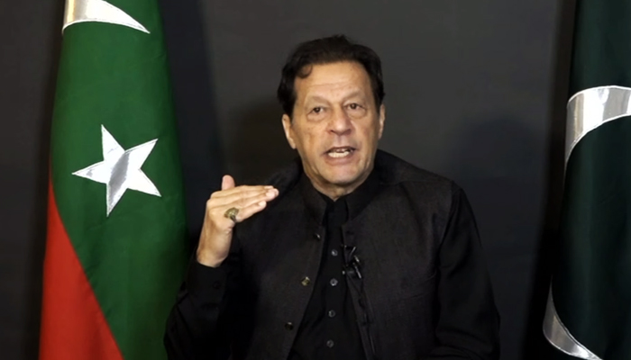 Pakistan Tehreek-e-Insaf (PTI) Chairman Imran Khan speaks during an address to the nation via video in Lahore on December 12, 2022. — YouTube/PTI