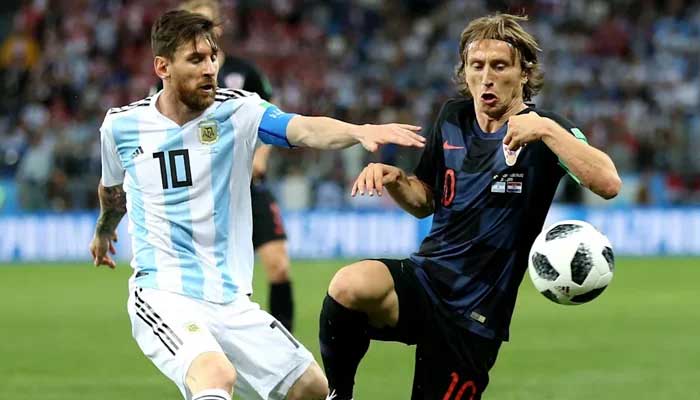 All eyes will be on Messi (L) and Modric (R) — AFP