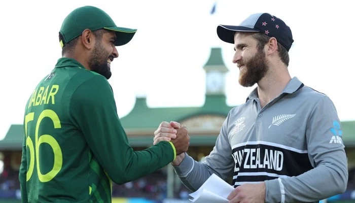 Babar Azam and Kane Williamson during the toss of a T20 World Cup match — AFP/File