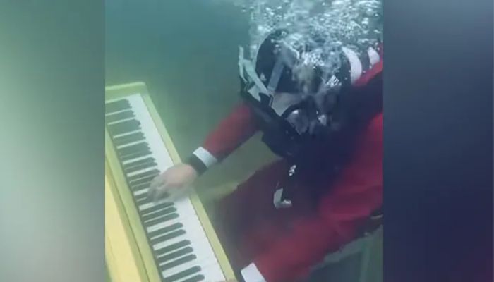 Video screengrab showsJoe Jenkins playing the piano underwater.— Instagram/Joe Jenkins