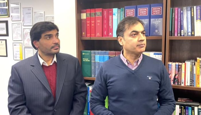 Prime Minister Shehbaz Sharifs son-in-law Imran Ali Yousaf (left) and his lawyer in the Daily Mail defamation case Barrister Waheed Ur Rehman Mian. — Photo by reporter