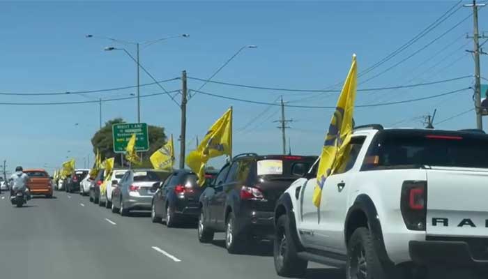 A trail of hundreds of vehicles participated in the car rally organised by Sikhs For Justice (SFJ) in Melbourne. — Photo by author
