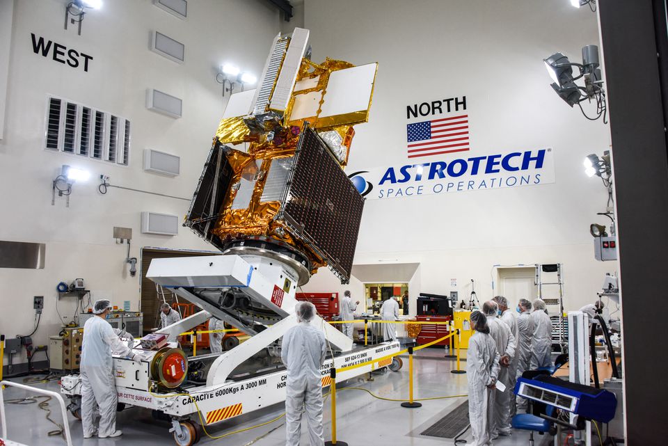 The Surface Water and Ocean Topography (SWOT) radar satellite spacecraft is moved into a transport container inside the Astrotech facility at Vandenberg Space Force Base in California, U.S. November 18, 2022.— Reuters
