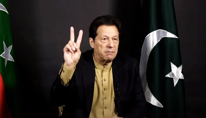 Pakistan Tehreek-e-Insaf (PTI) Chairman Imran Khan addresses the nation via video link in Lahore on December 14, 2022. — YouTube/PTVNewsLive