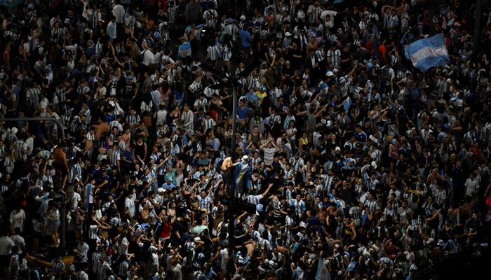 In pictures: Argentina delirious as Messi inspires run to World Cup final