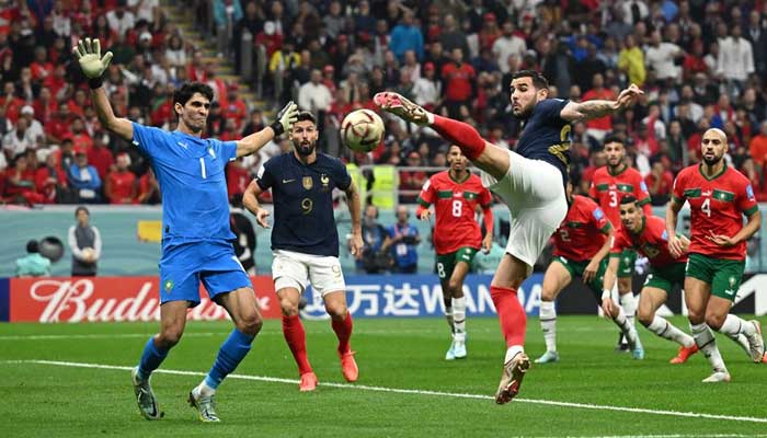 Soccer Football - FIFA World Cup Qatar 2022 - Semi Final - France v Morocco - Al Bayt Stadium, Al Khor, Qatar - December 14, 2022 Frances Theo Hernandez scores their first goal REUTERS/Dylan Martinez