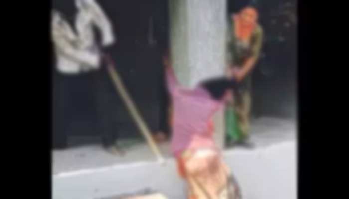 Woman tied, beaten by in-laws in Rajkot India — TOI
