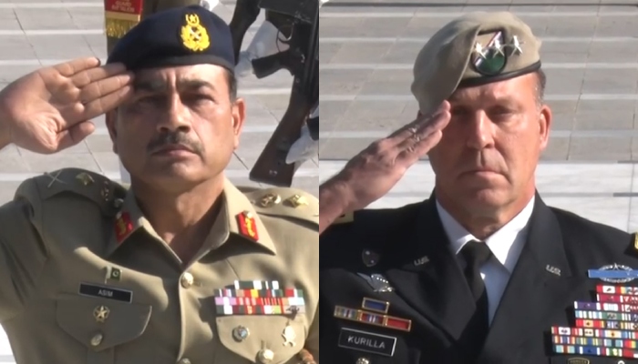 General Michael Erik Kurilla (right) and General Asim Munir offering tributes at the Martyrs’ Monument in Rawalpindi on December 15, 2022. — ISPR