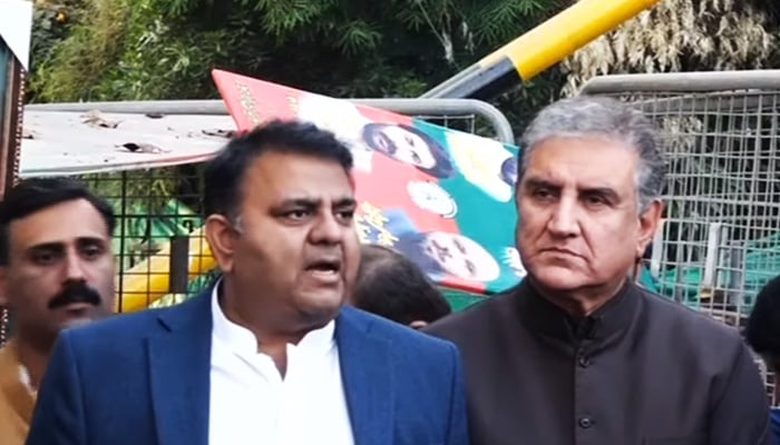PTI Senior Vice-President Fawad Chaudhry (left) addresses a press conference alongside partys Vice-Chairman Shah Mahmood Qureshi in Lahore on December 15, 2022. — YouTube/GeoNews