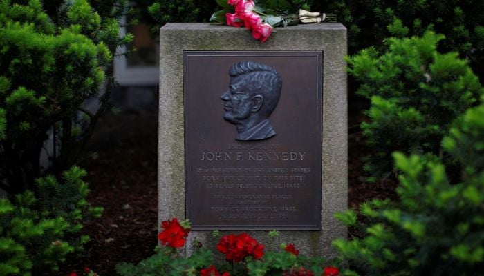 Roses lie on a marker outside the home where President John F. Kennedy was born 100 years ago on May 29, 1917, in Brookline, Massachusetts, US, May 29, 2017.— Reuters
