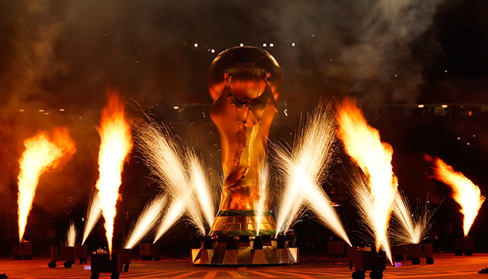 Soccer Football - FIFA World Cup Qatar 2022 - Third-Place Playoff - Croatia v Morocco - Khalifa International Stadium, Doha, Qatar - December 17, 2022. A giant World Cup trophy replica is seen on the pitch during a pyrotechnic display before the match. — Reuters