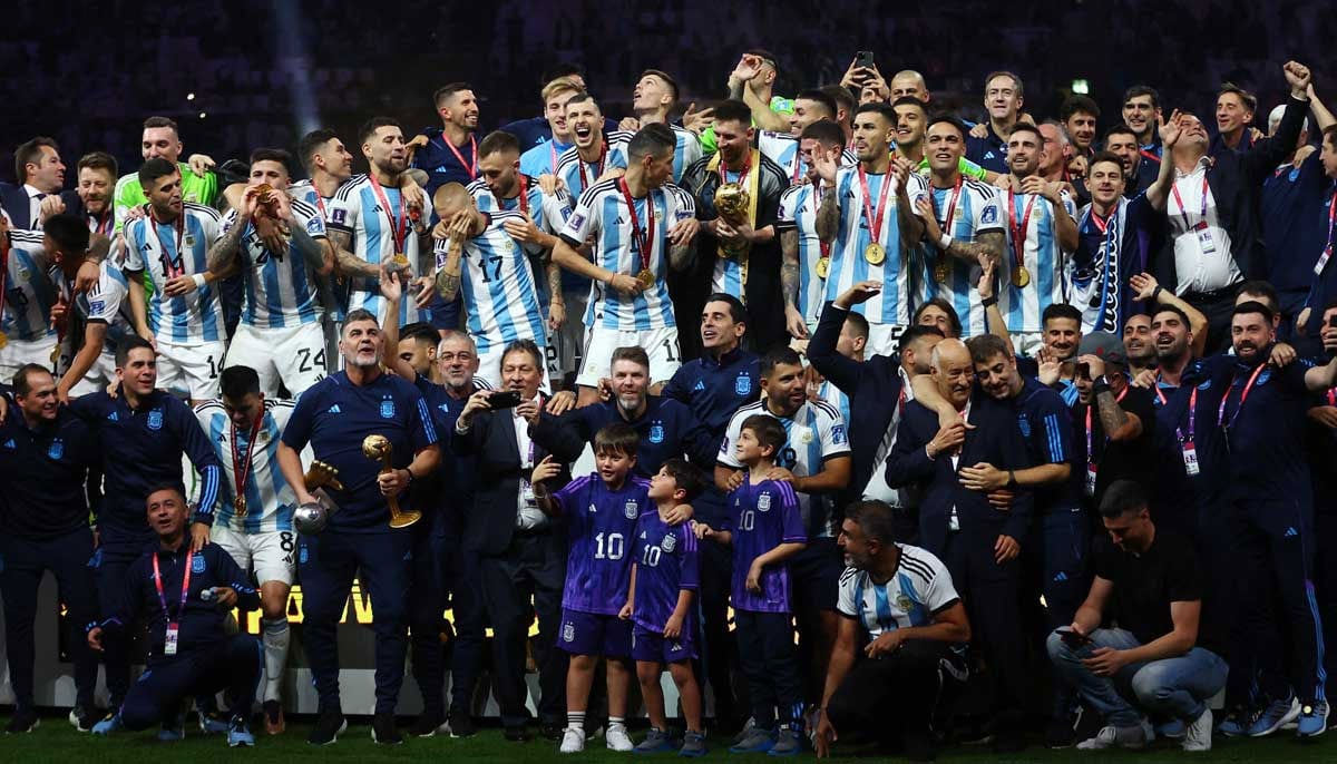 Argentina celebrate with the trophy after winning the World Cup. — Reuters