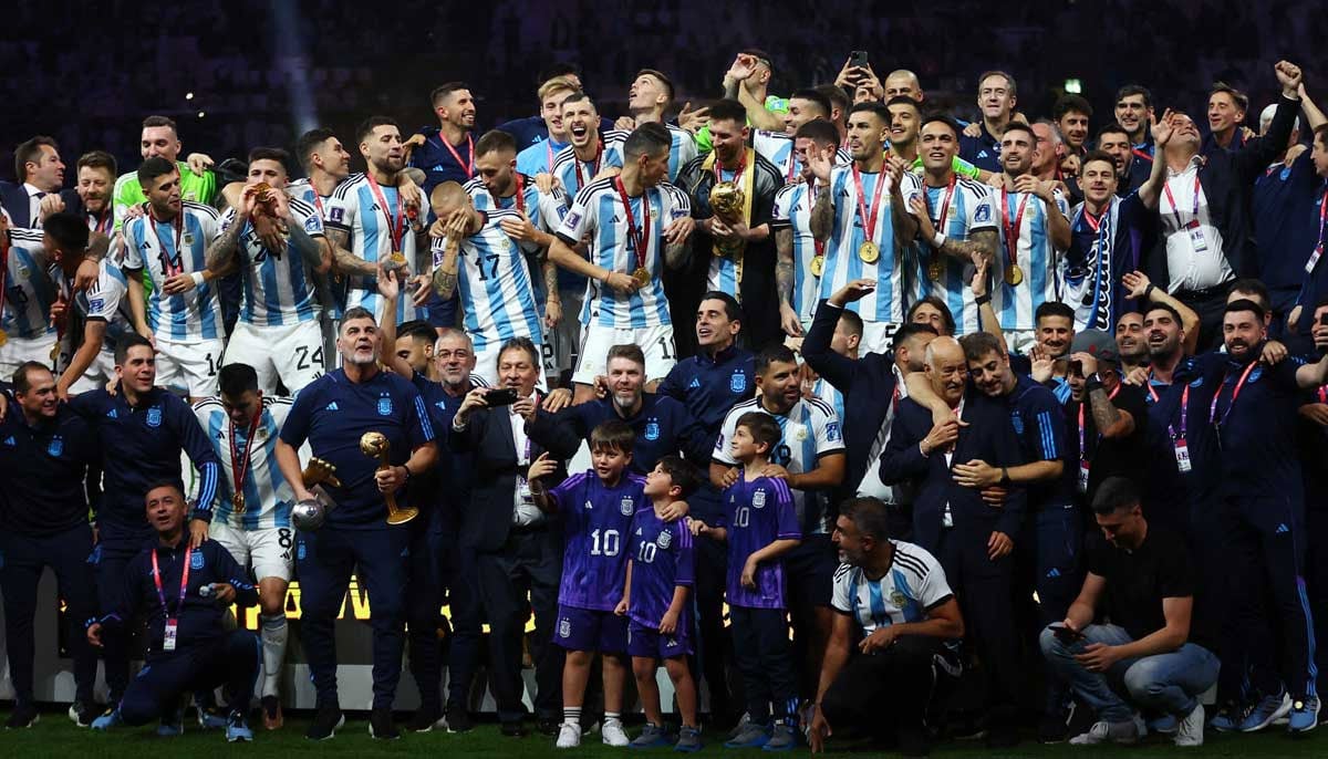 Argentina celebrate with the trophy after winning the World Cup.— Reuters