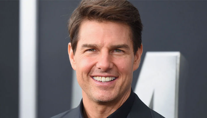 Tom Cruise wishes ‘Happy Holidays’ while skydiving during shoot