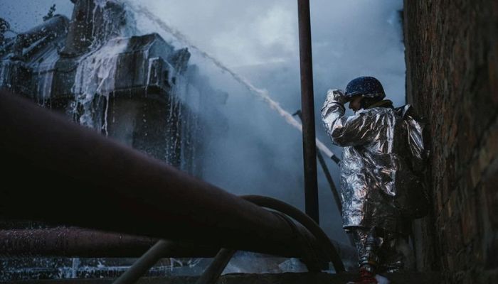 A firefighter works at a site of a critical power infrastructure object, which was hit during Russias drones attacks in Kyiv, Ukraine, in this handout picture released December 19, 2022.— Reuters