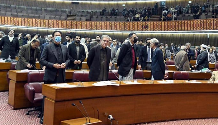 Former prime minister Imran Khan and other PTI MNAs during voting at the National Assembly on Jan 13, 2022. — APP