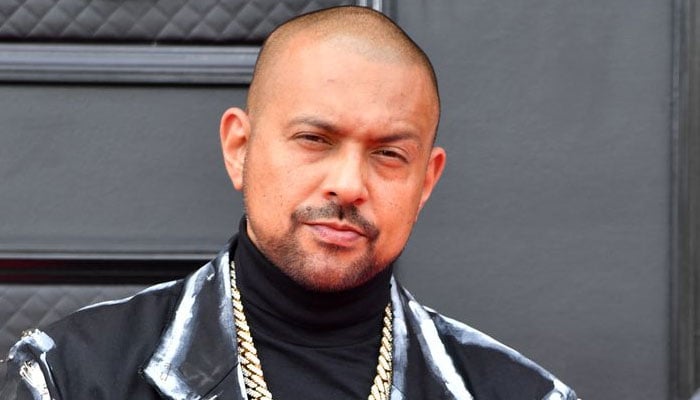 Sean Paul responds to a fan theory about NOT singing his name in songs