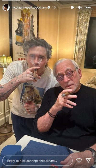 Brooklyn Beckham poses with Nicola Peltz’s dad as they celebrate Hanukkah
