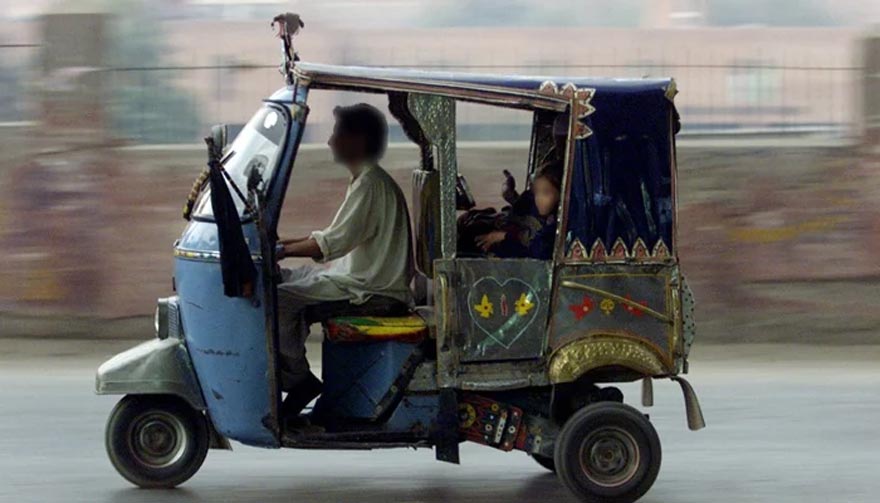 A man can be seen riding a rickshaw in this undated photo. — Reuters/File