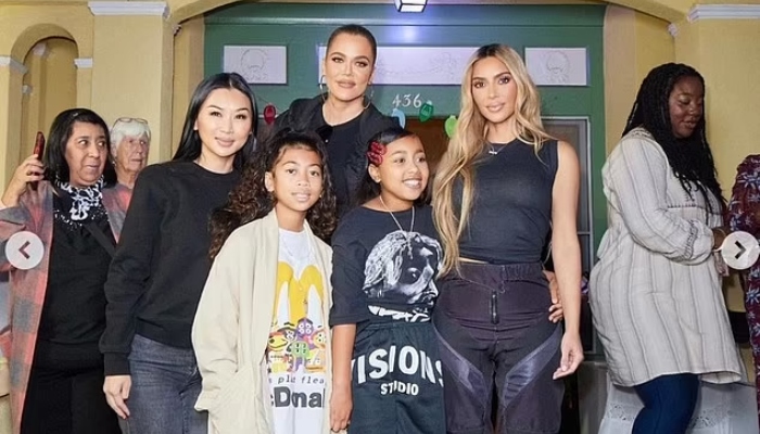 Kim Kardashian and sister Khloe hand out festive gifts to homeless women in L.A