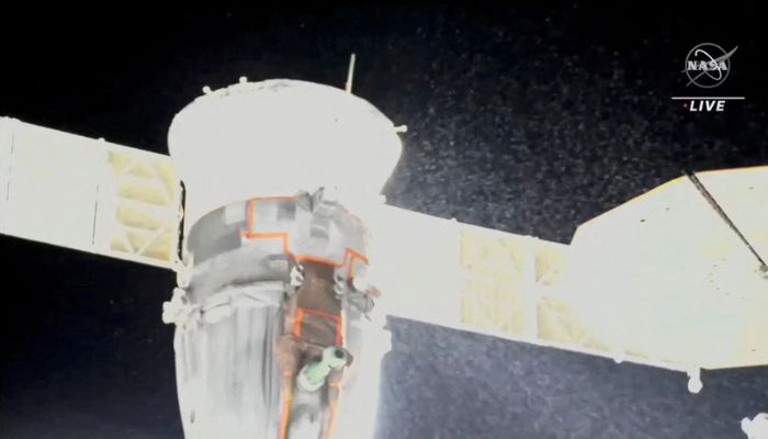 A stream of particles, which NASA says appears to be liquid and possibly coolant, sprays out of the Soyuz spacecraft on the International Space Station, forcing a delay of a routine planned spacewalk by two Russian cosmonauts December 14, 2022 in this still image taken from video.— Reuters