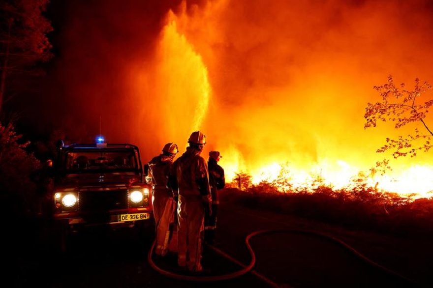 Firefighters work to contain a tactical fire in Louchats, as wildfires continue to spread in the Gironde region of southwestern France, July 17, 2022. — Reuters