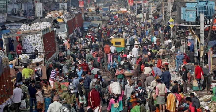 People shop in a crowded market in Kolkata, India, January 6, 2022. — Reuters