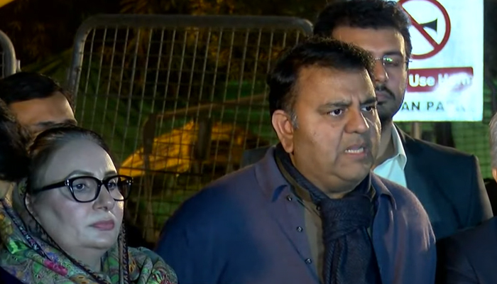 PTI Senior Vice President Fawad Chaudhry (right) addresses a press conference alongside party leader Musarrat Jamshed Cheema in Lahore on December 24, 2022. YouTube/GeoNews