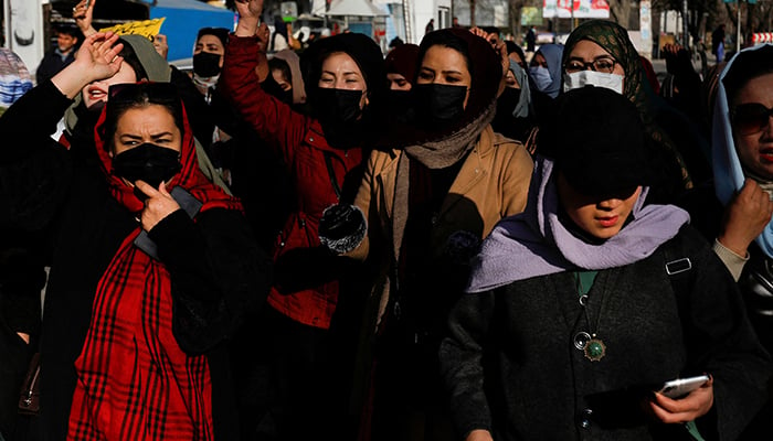 Afghan women chant slogans in protest against the closure of universities to women by the Taliban in Kabul, Afghanistan, December 22, 2022. — Reuters
