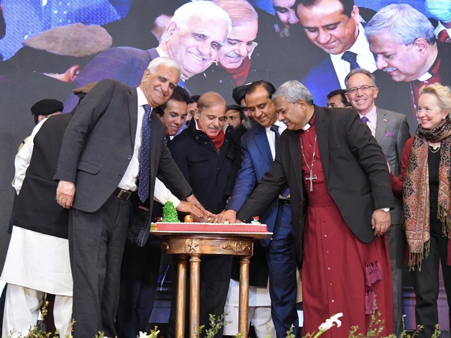 Prime Minister Shehbaz Sharif cutting cake during Christmas celebrations on December 24, 2022. — Twitter