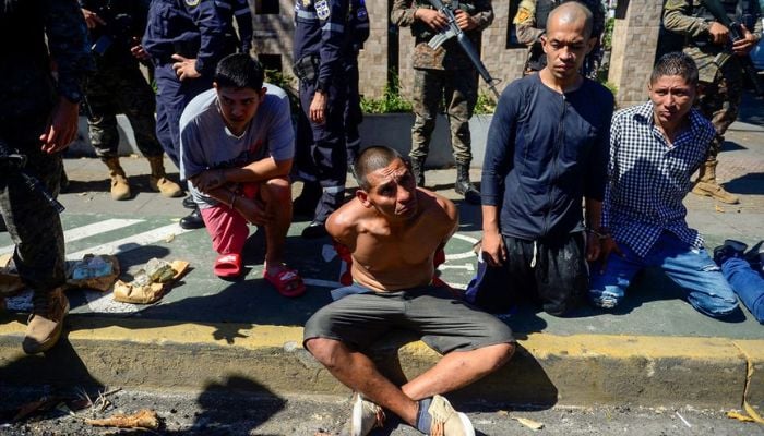 Members of the security forces kick off Christmas Eve with a military operation against drug traffickers where they detained suspected criminals in El Salvadors capital, according to government information as part of the countrys controversial attempt to fight criminal gangs, in San Salvador, El Salvador December 24, 2022.— Reuters