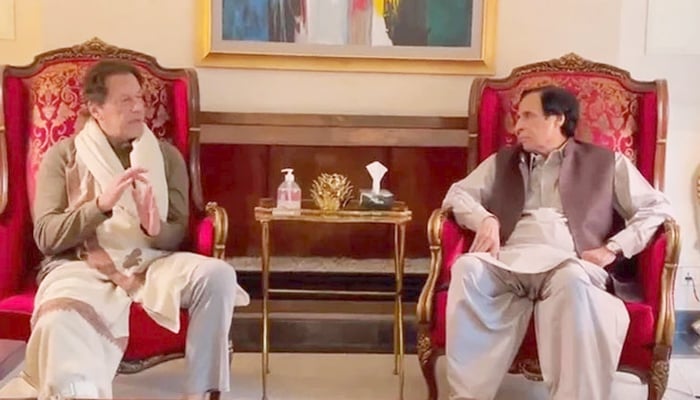 Chief Minister Punjab Chaudhry Parvez Elahi (right) meets PTI Chairman Imran Khan in Lahores Zaman Park on December 1, 2022. — Twitter/PT