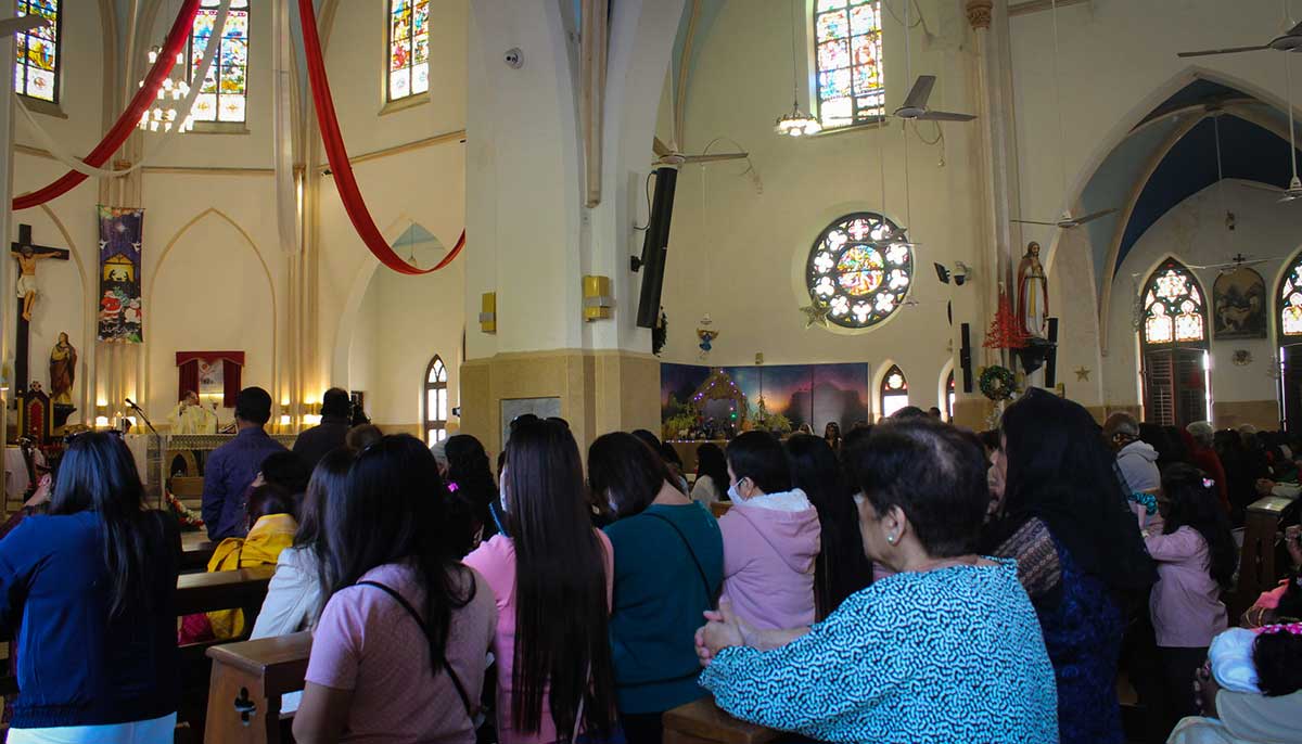 View of the church from the inside as Christmas Day mass continues with devotees praying at theSt. Patricks Cathedral in Karachis Saddar area on December 25, 2022. — Photos by author