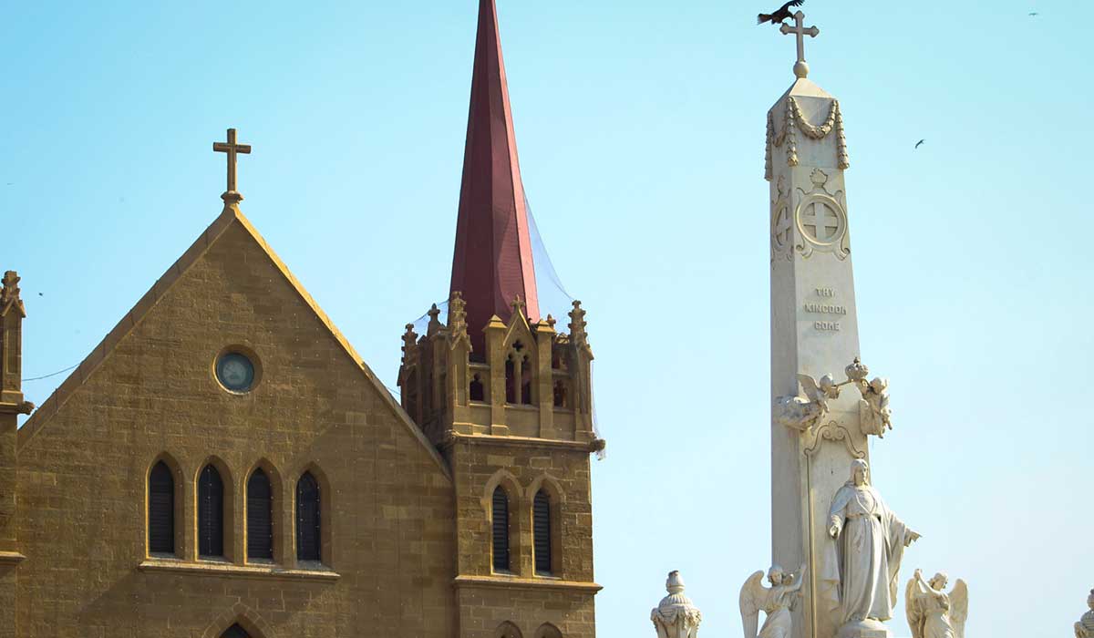 View of the St. Patricks Cathedral in the backdrop of the Monument to Christ the King.